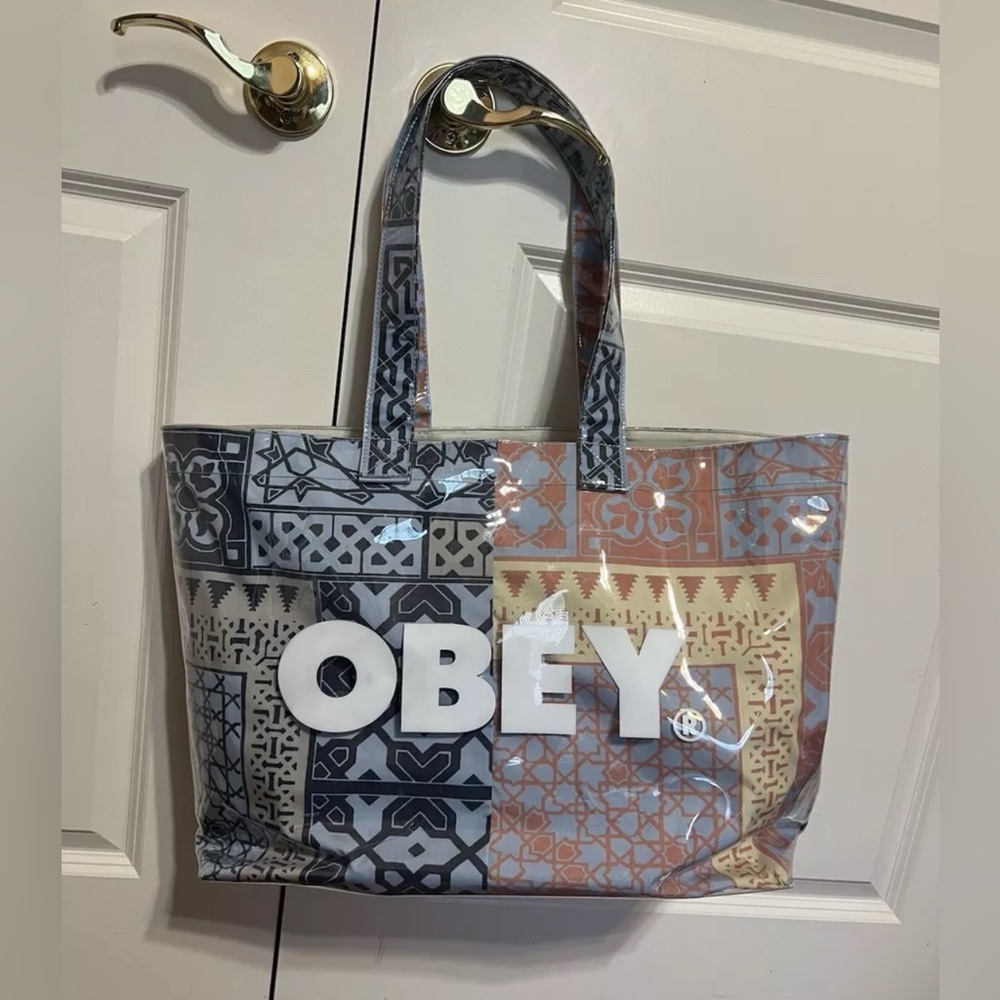 Obey Shepard Fairey Tribal Tote Bag in blue, yellow, and orange